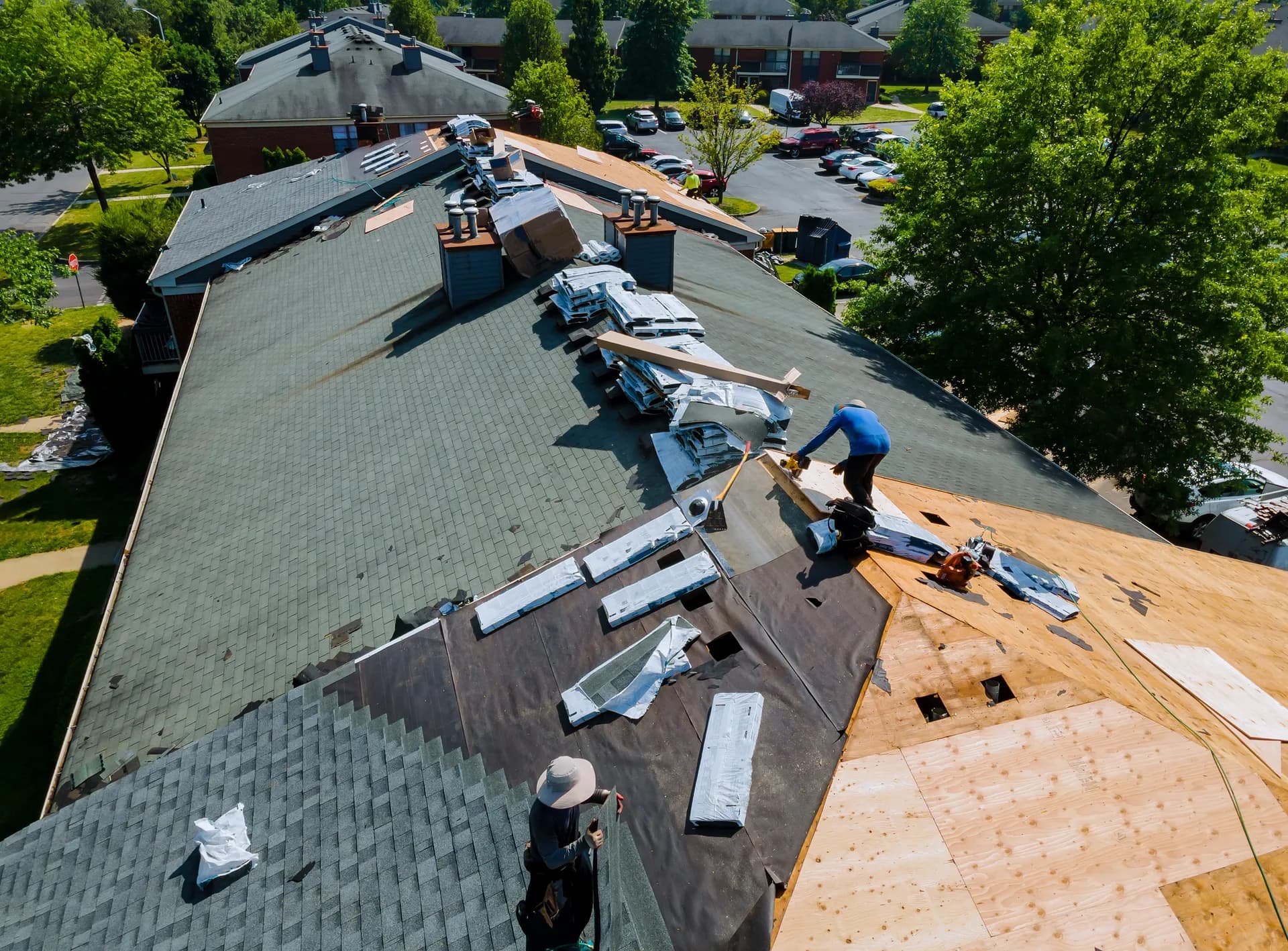 Professional roofer installing new roof